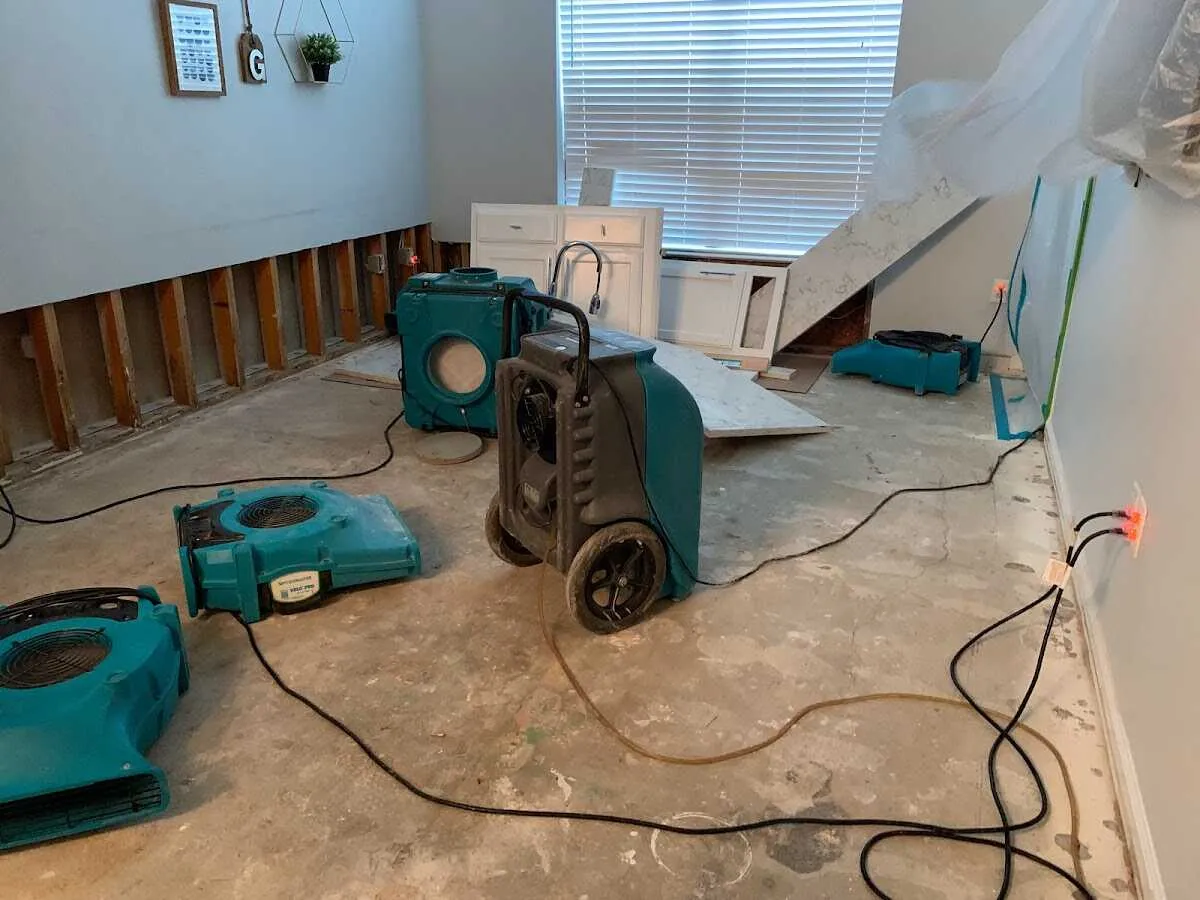 Dehumidifier in flood-cut room for Water Damage Restoration in Upper Milford